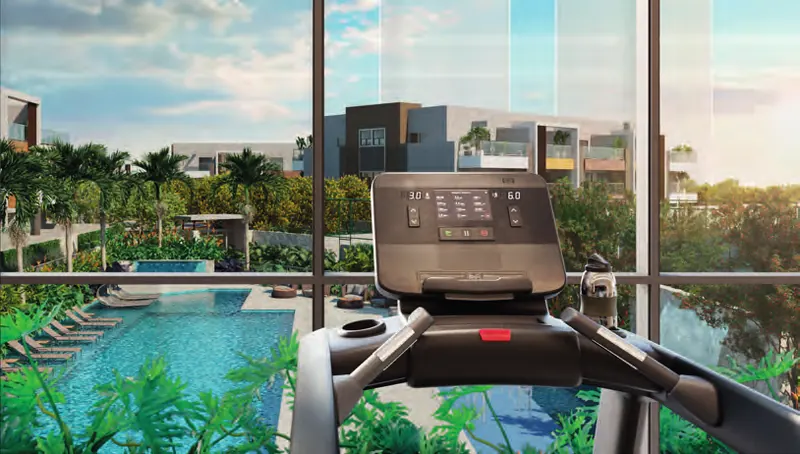 Fitness do Claris Casa & Clube com esteiras voltadas para o verde